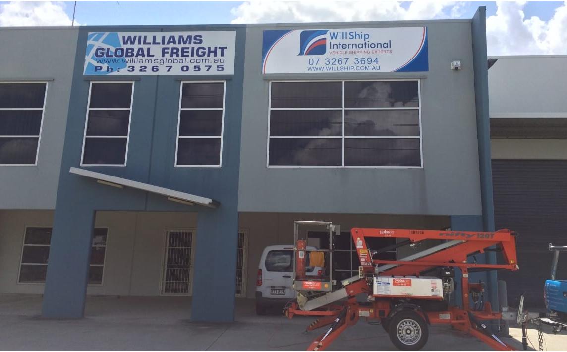 Access equipment height building signage